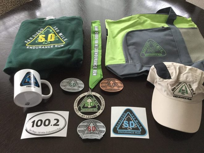 A finisher gets all of this schwag and more. We also got Injinji socks, a show bag, recovery powder, a buff, etc, etc.